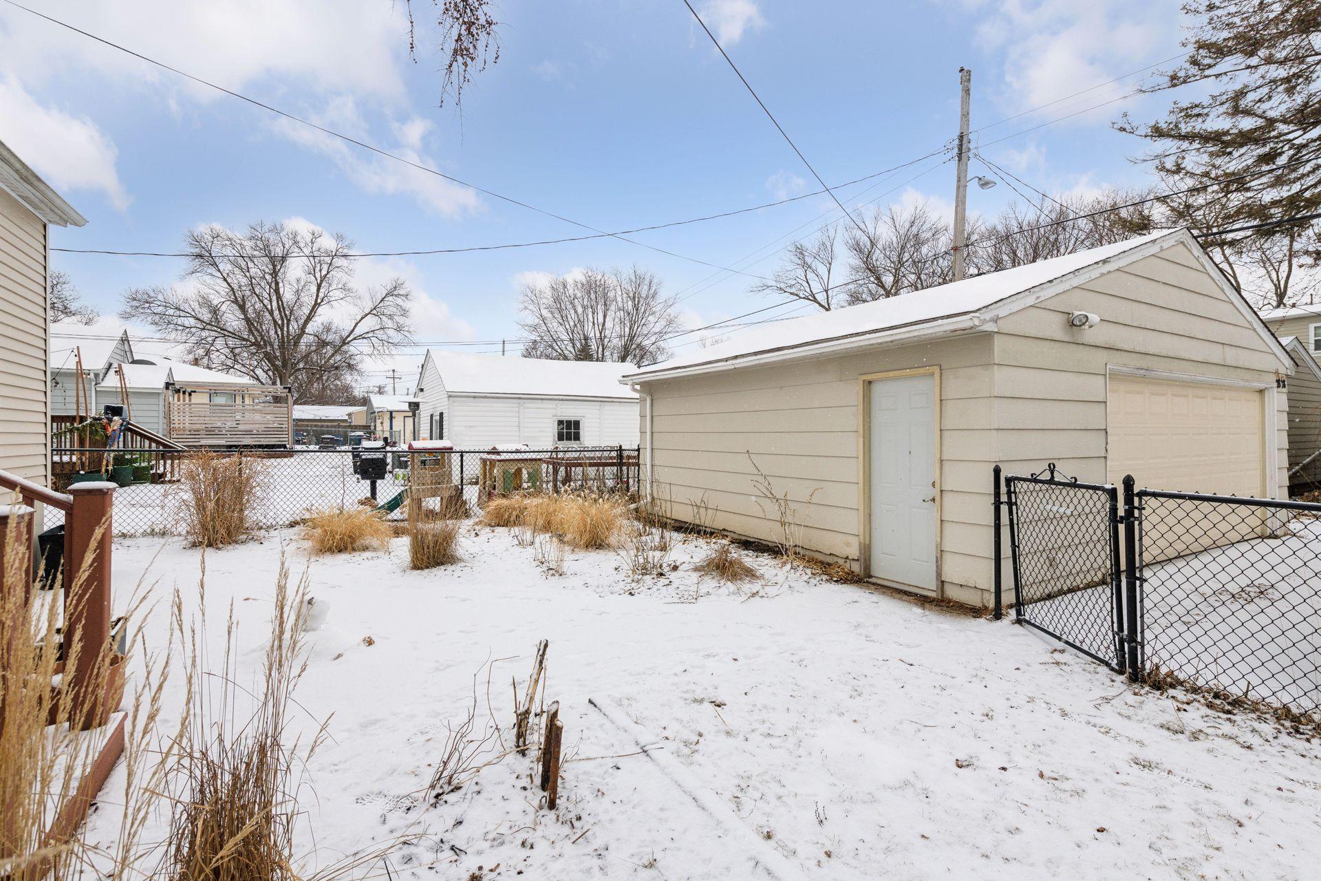 Oversized 2-car garage with storage and workbench