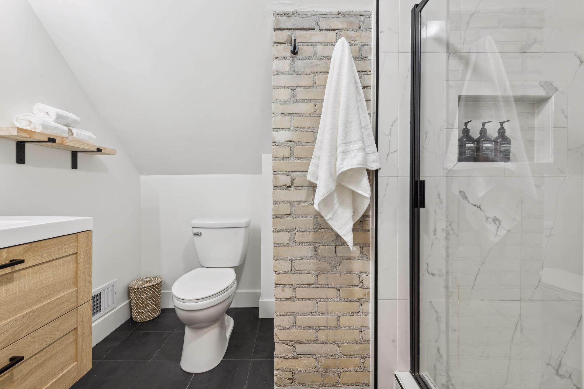 New 3/4 bath with glass shower door and tile!