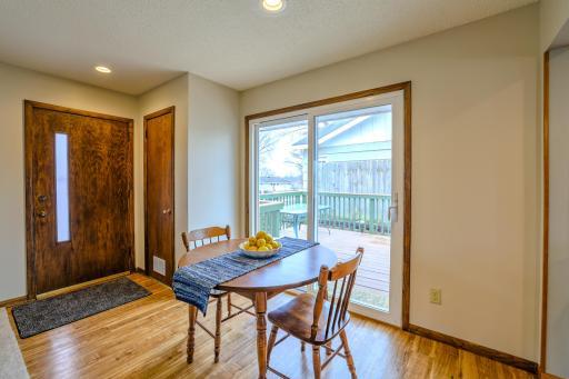 Main-Level Dining Area with Deck Access - Dining area with durable flooring and sliding glass door access to the composite deck. The layout offers seamless indoor-outdoor flow for everyday meals and entertaining.