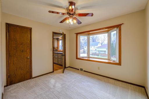 Flexible Bed/Dining room without staging. (Alternate view) View of doorway to kitchen.