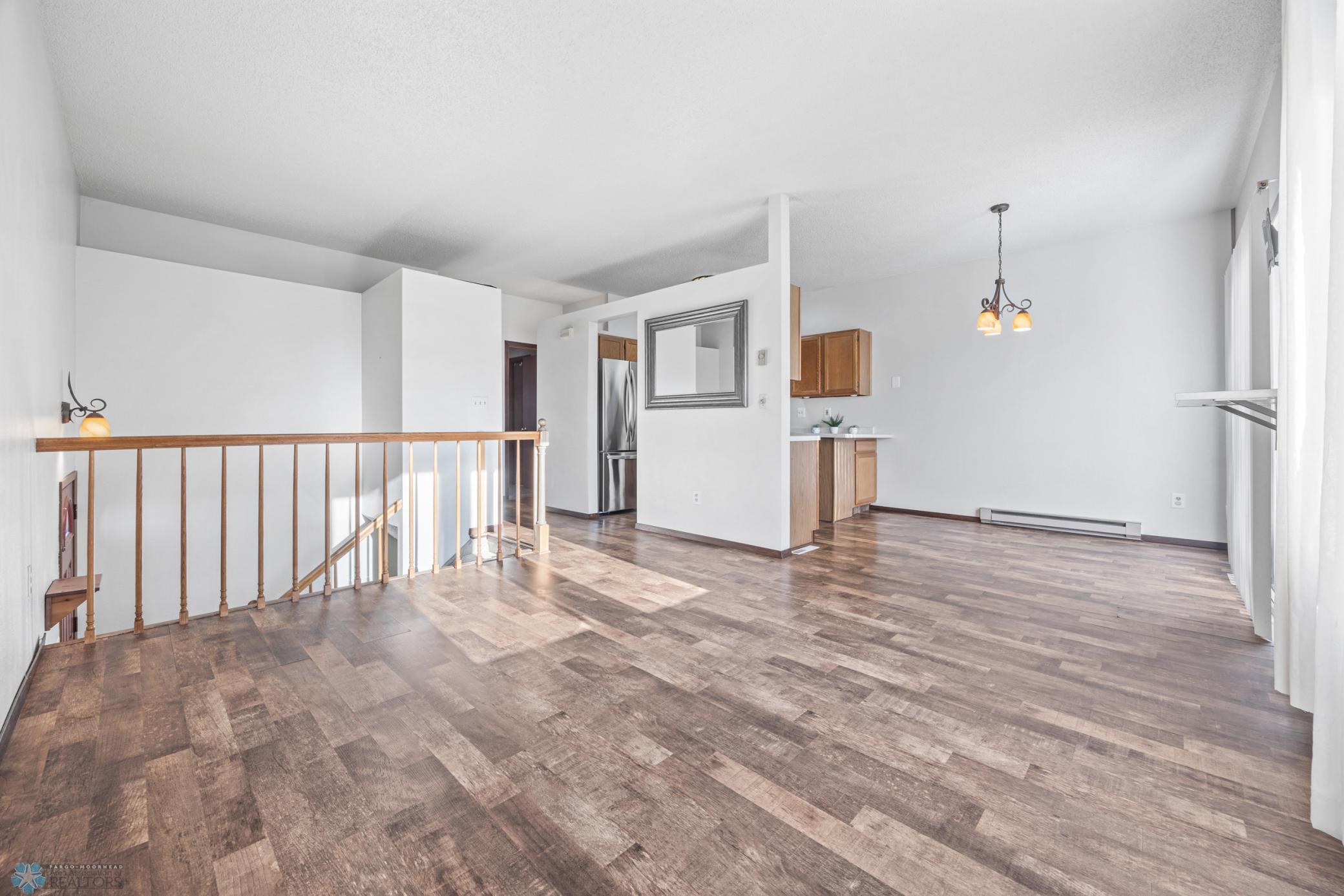 Open floorplan - view to dining/kitchen
