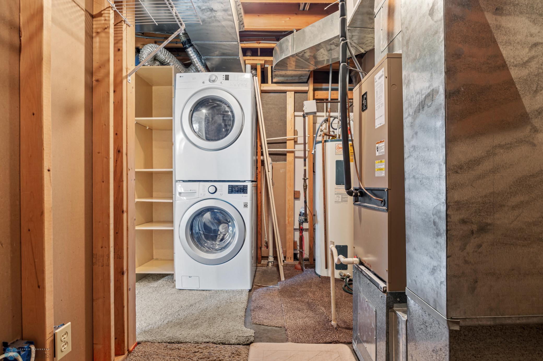 Mechanical room - washer/dryer included, ample storage