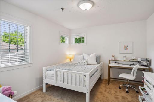 One of two additional bedrooms on the upper level.