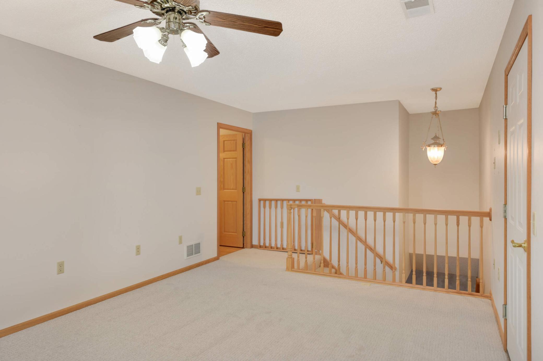 2nd Floor Family Room with Stairway to Main Level
