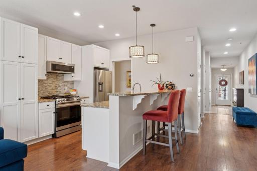 Crisp white cabinetry topped with granite!