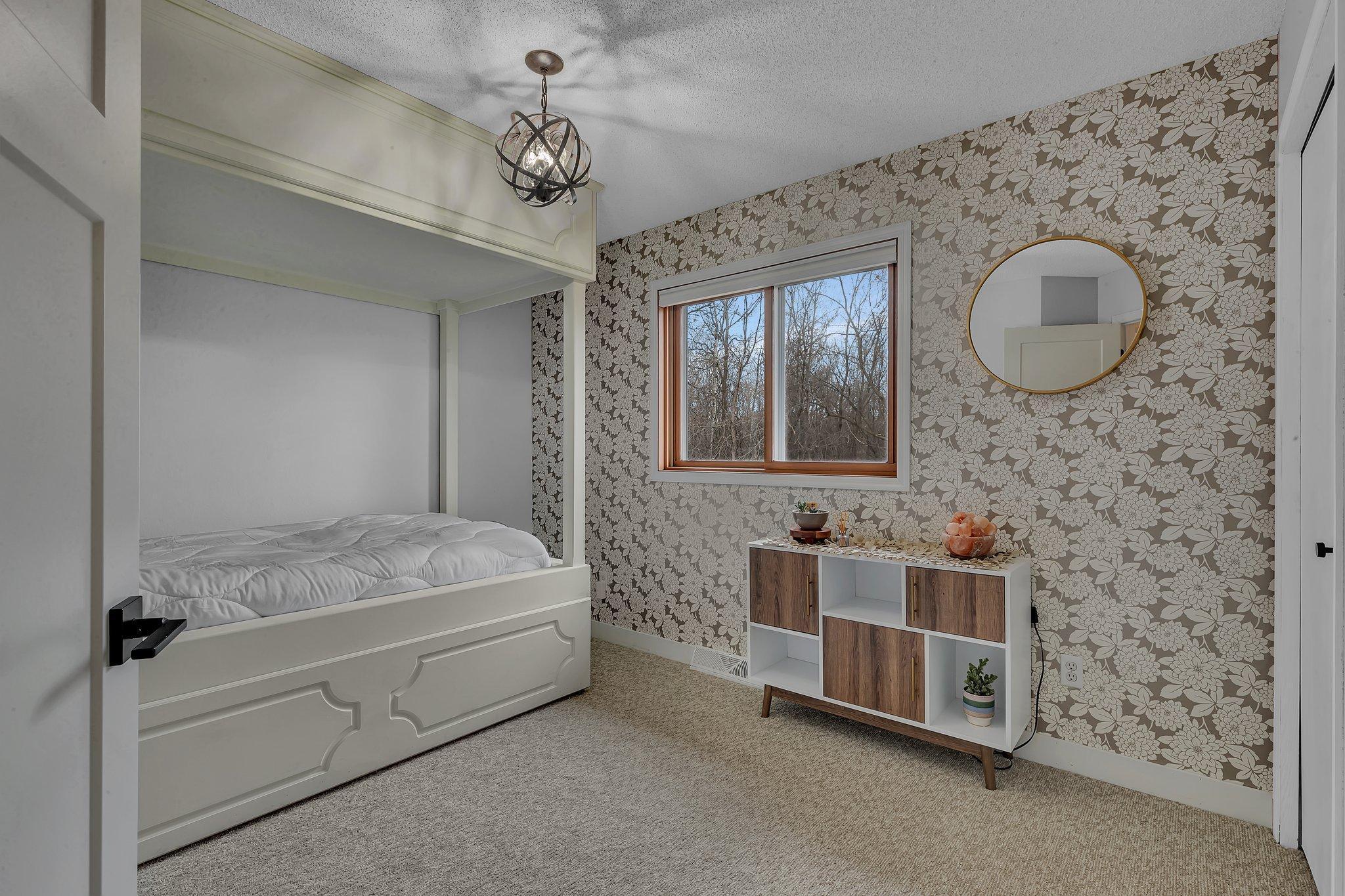 UL Bedroom 2 with a Built in Canopy Bed and Pullout Trundle