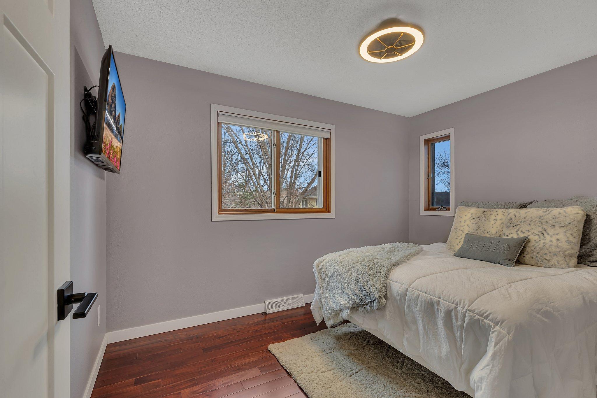 UL Bedroom 3 with Hardwood Flooring and New Fixture