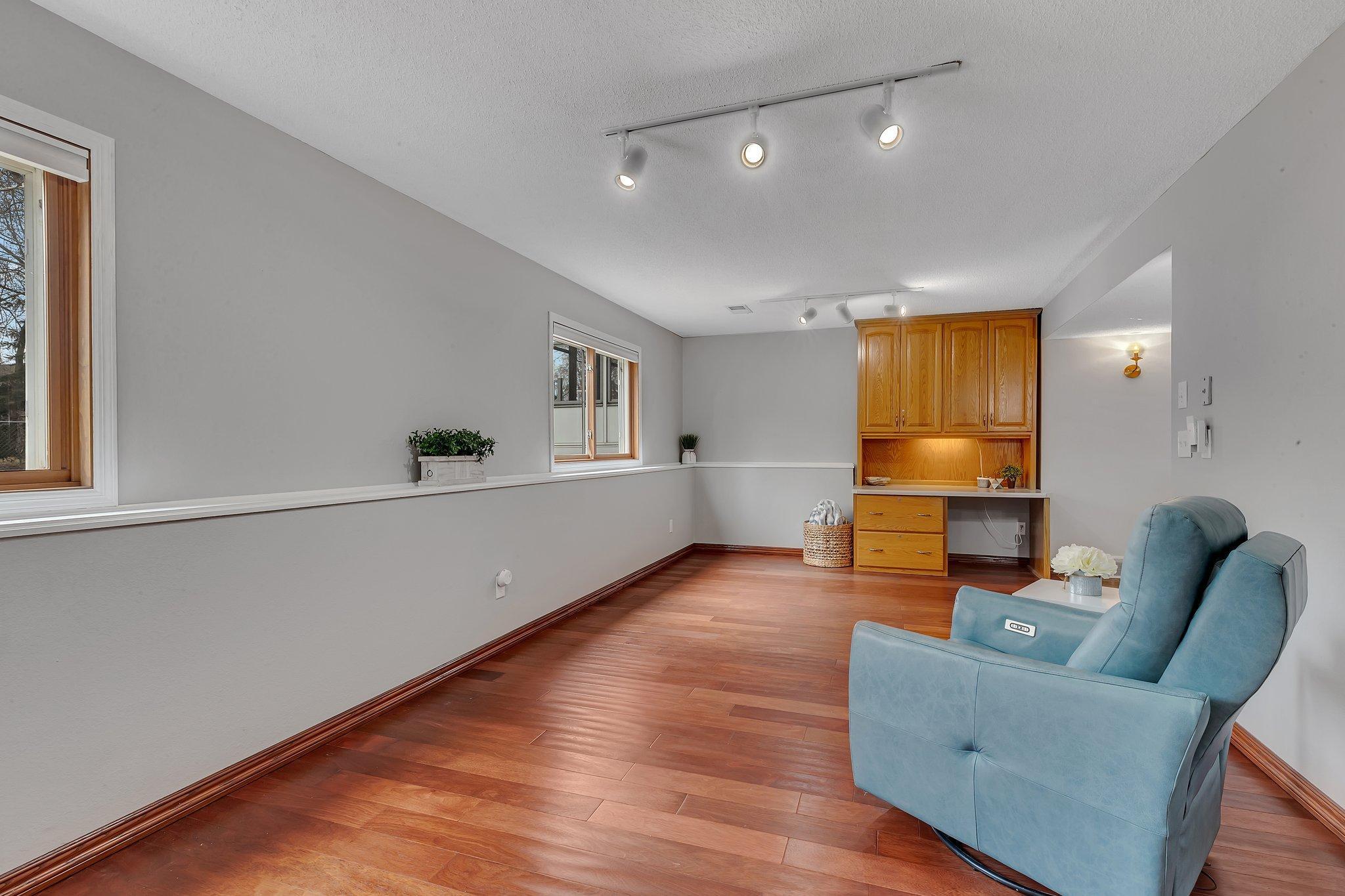 More Beautiful Hardwood Flooring. Large Desk and Cabinets for Office Space Option