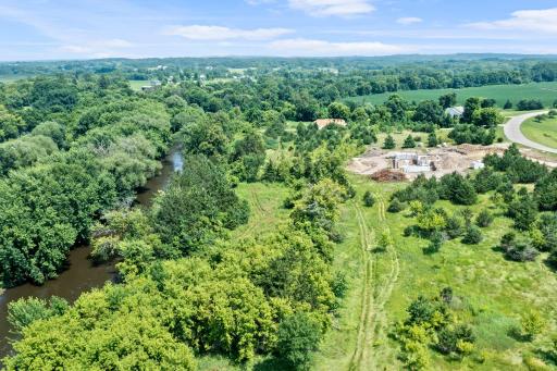 Experience the ultimate in country living with this stunning 2-acre lot offering beautiful North Fork Crow river frontage.