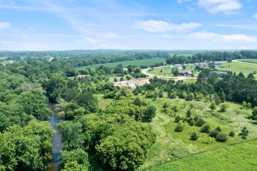 Experience the ultimate in country living with this stunning 2-acre lot offering beautiful North Fork Crow river frontage.