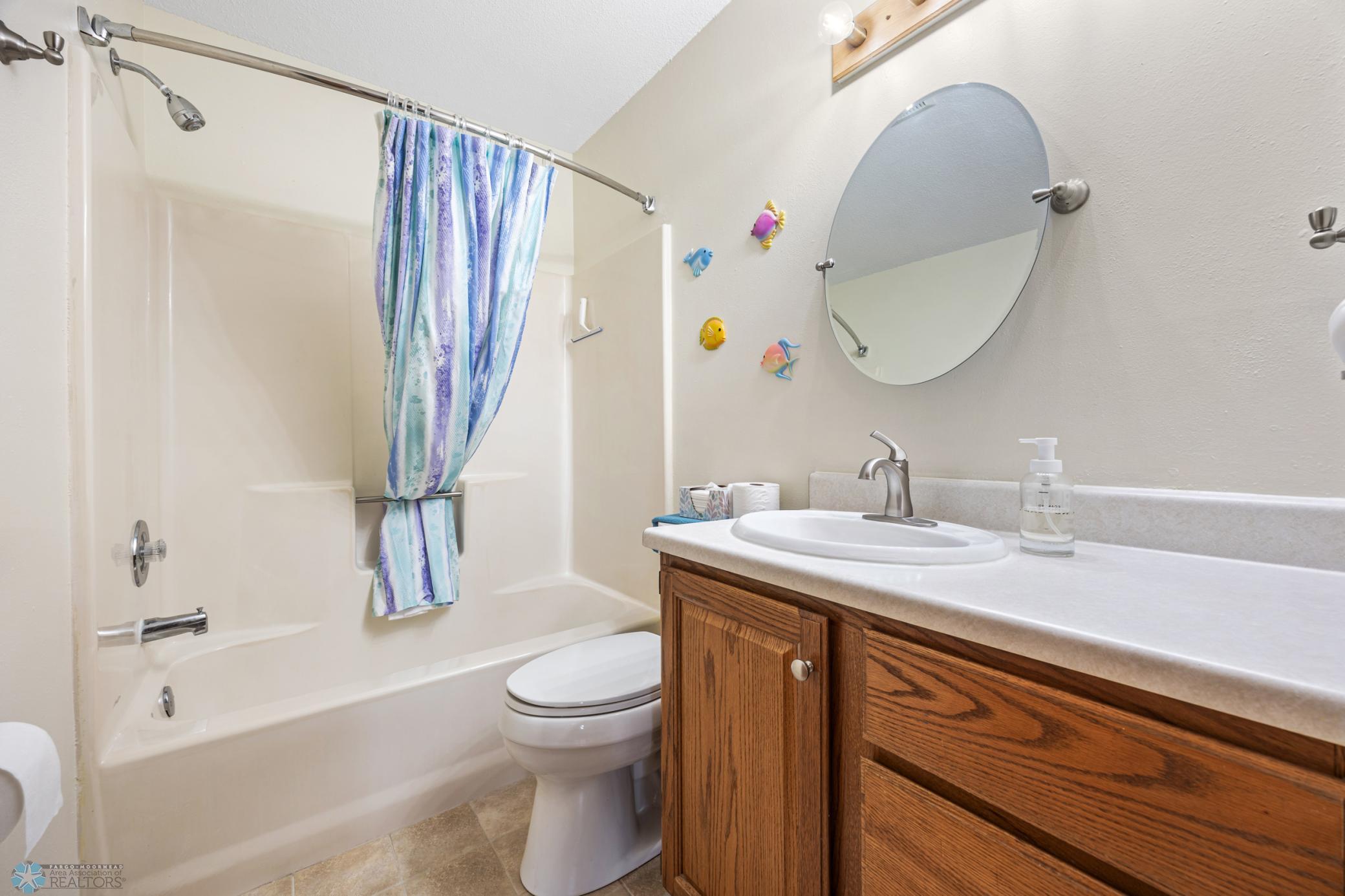 Lower Level Full Bath - with tile floors