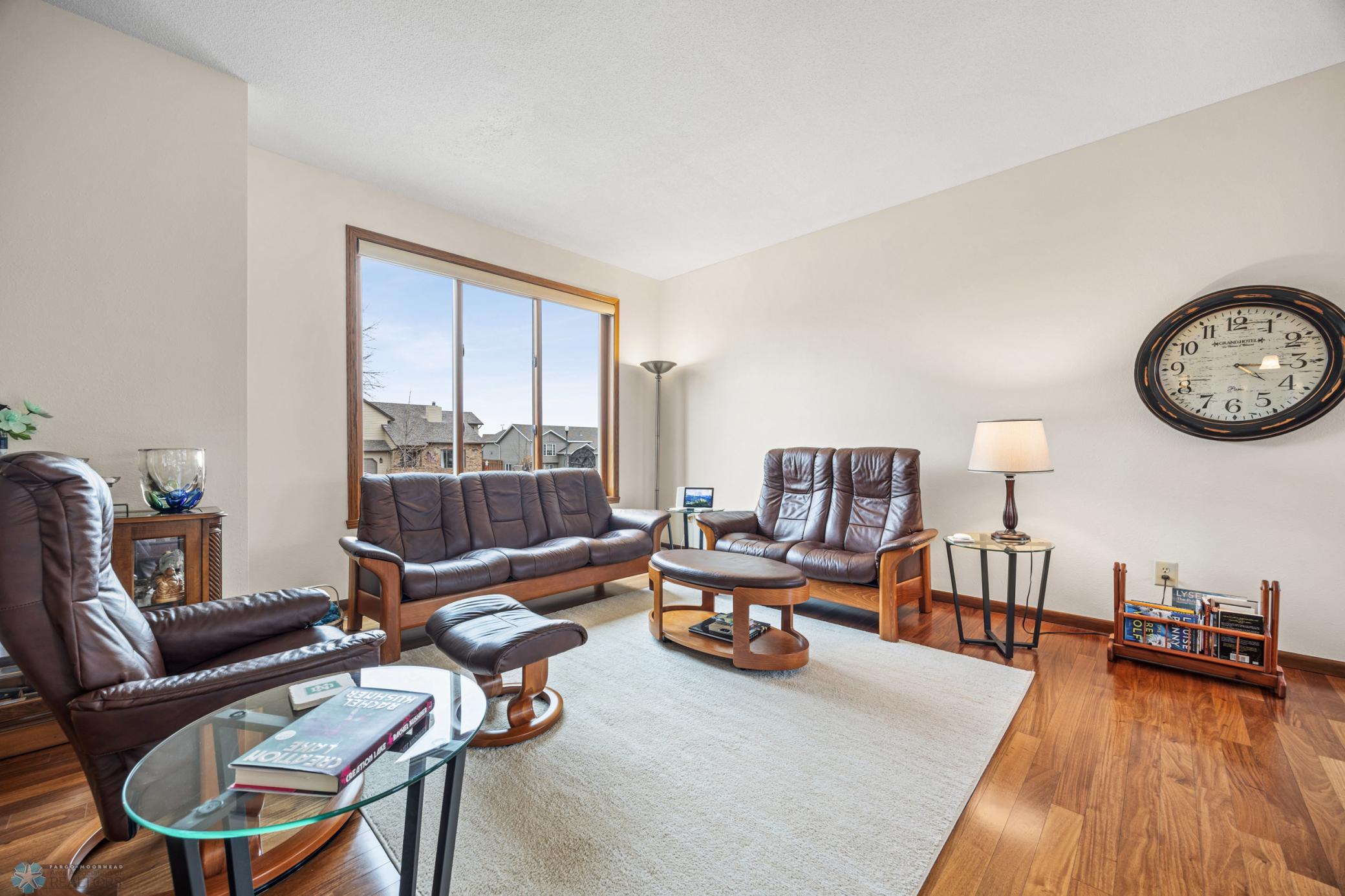 Living Room - with REAL hardwood floors and remote operated window treatments