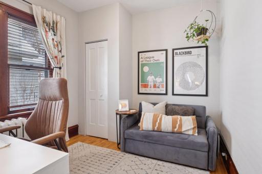 Main level bedroom perfect for a home office or additional living space
