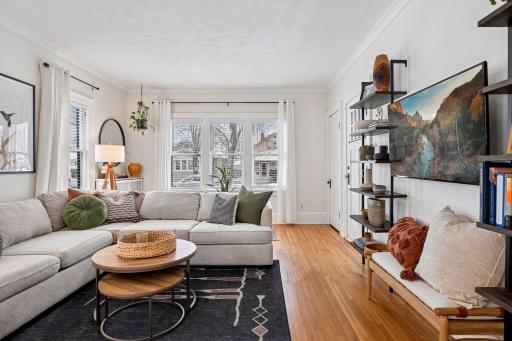 Main level living room with ample space for entertaining friends and family