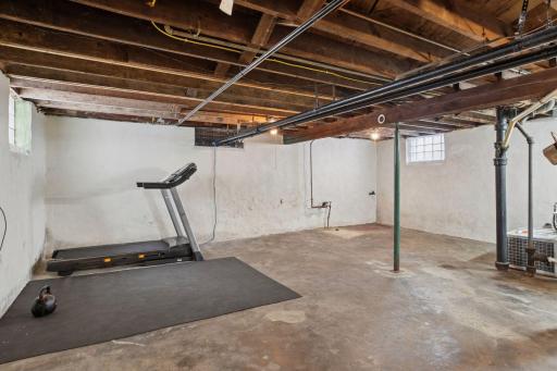 Unfinished lower level perfect for a home gym or an added living space