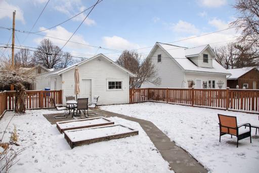 Spacious backyard with the detached garage