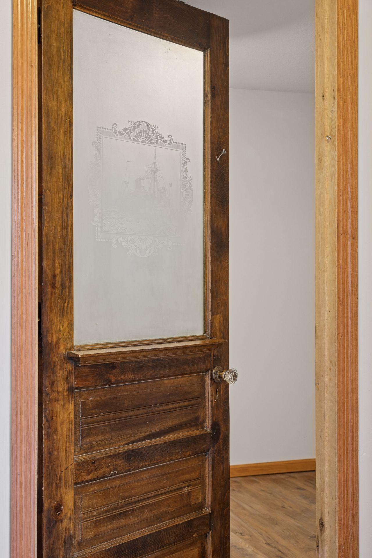 Vintage door leading into Flex room