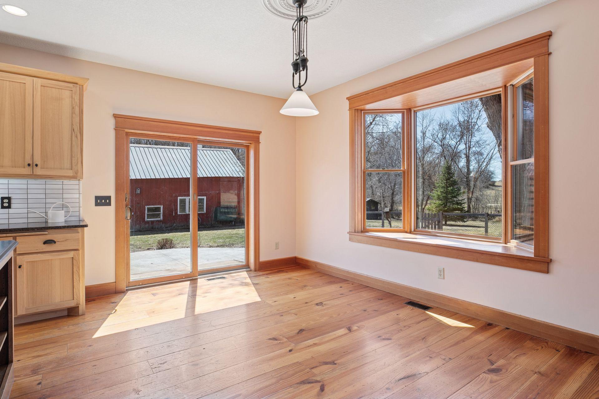 Dining area off kitchen with bay window