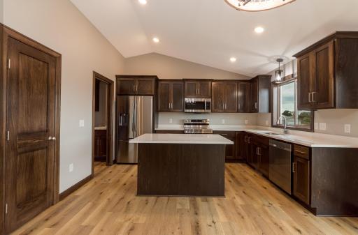 Custom built cabinets and plenty of counter space