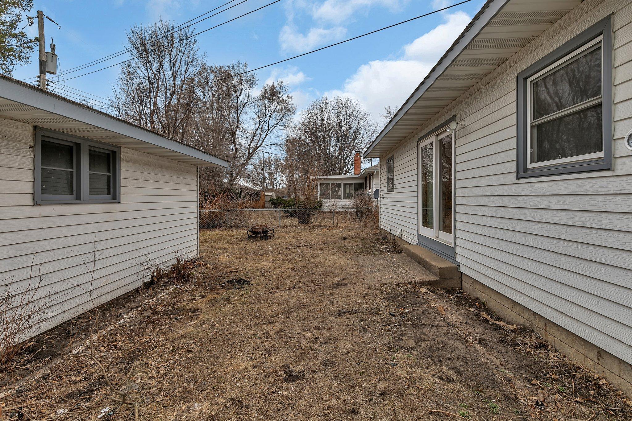 Between garage and house