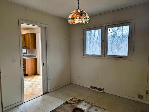 3rd main level bedroom - walk thru to kitchen