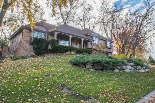 Photo for 11545 39th Avenue N, Minneapolis, MN 55441 - listing #6688789 Front view showing the professional landscaping