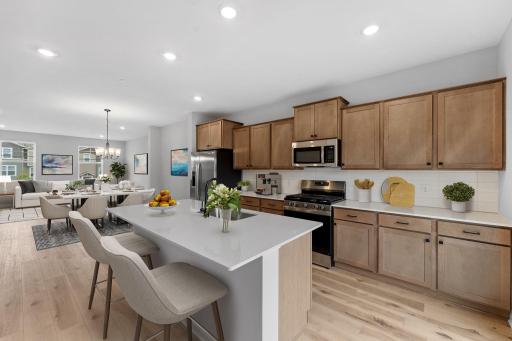 Kitchen of similar home. Virtually staged
