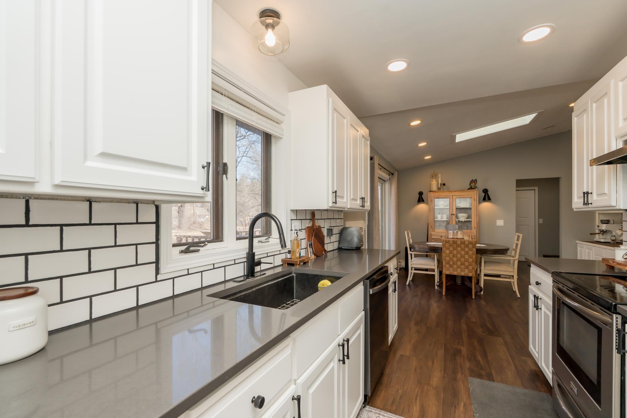 A lot of natural lighting with the kitchen window, deck door and skylight