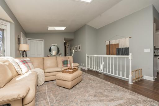 View of your entry, hallway to bedrooms and stairs leading to the basement