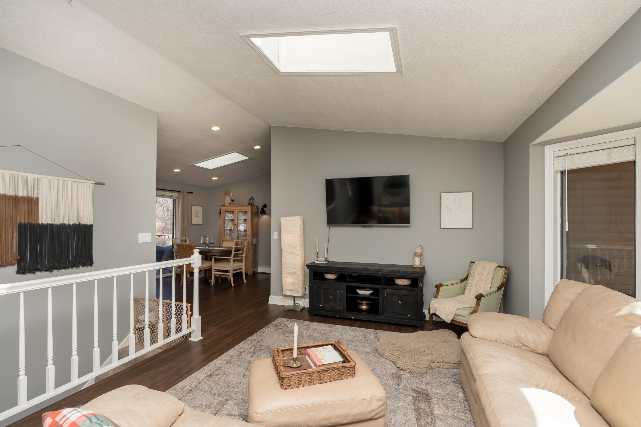 Main floor living area and views into the dining room