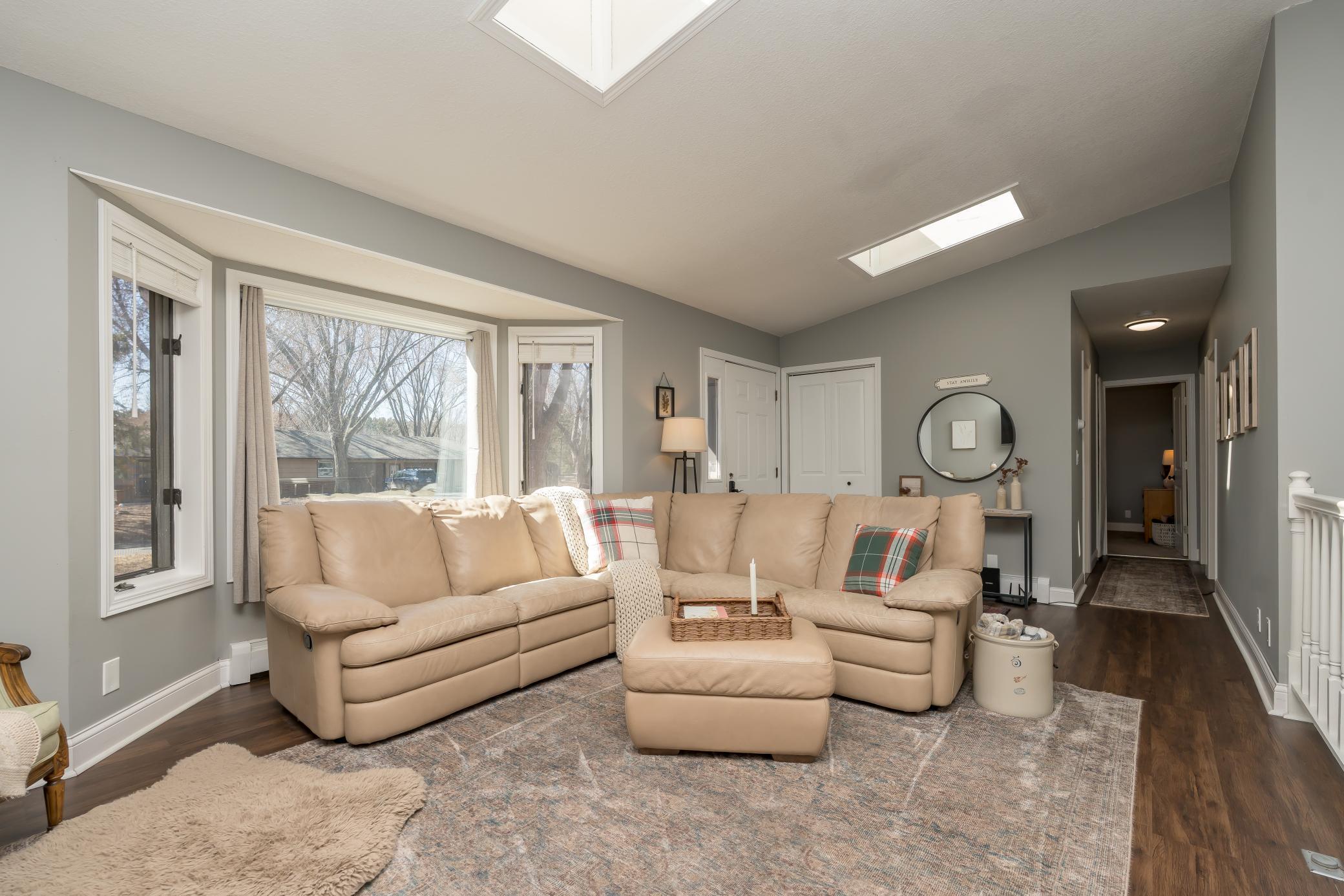 Tons of natural lighting in your living space with the large bay window and skylight