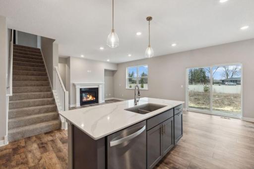Welcome to 6187 Jensen Alcove. Tucked on a quiet cul-de-sac with a pond view out back. Home for sale will have an electric fireplace and mantle. Exact same floorplan and color package shown here.