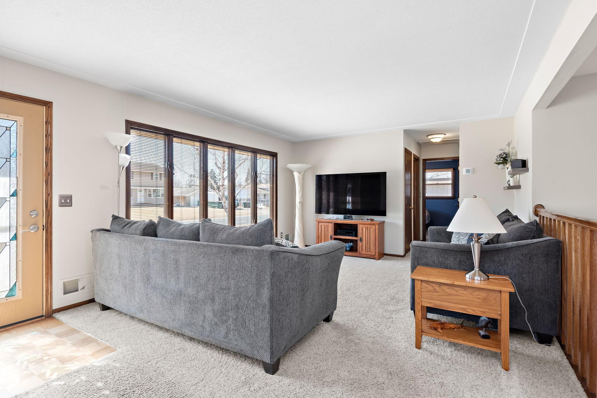 Light and bright south facing front living room windows!