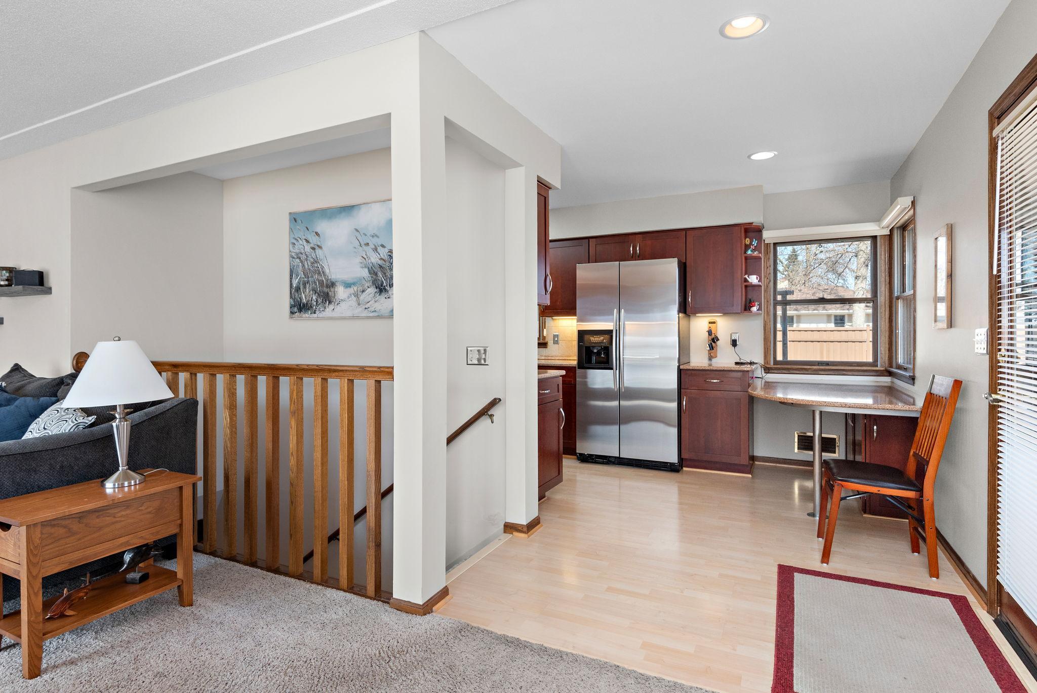 Open staircase leads to lower level!