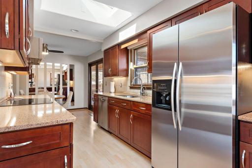 Beautiful updated kitched w/SS appliances and granite countertops!