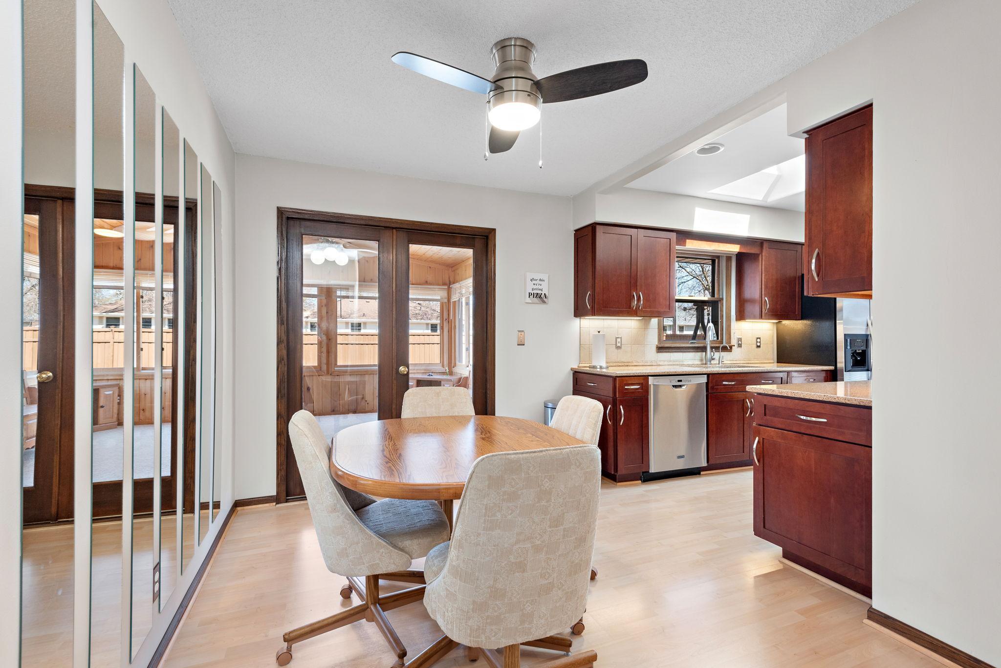 Informal dining area opens to 3 season porch you will love!