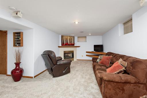 Awesome lower level provides a great space to entertain in front of the cozy gas FPL!
