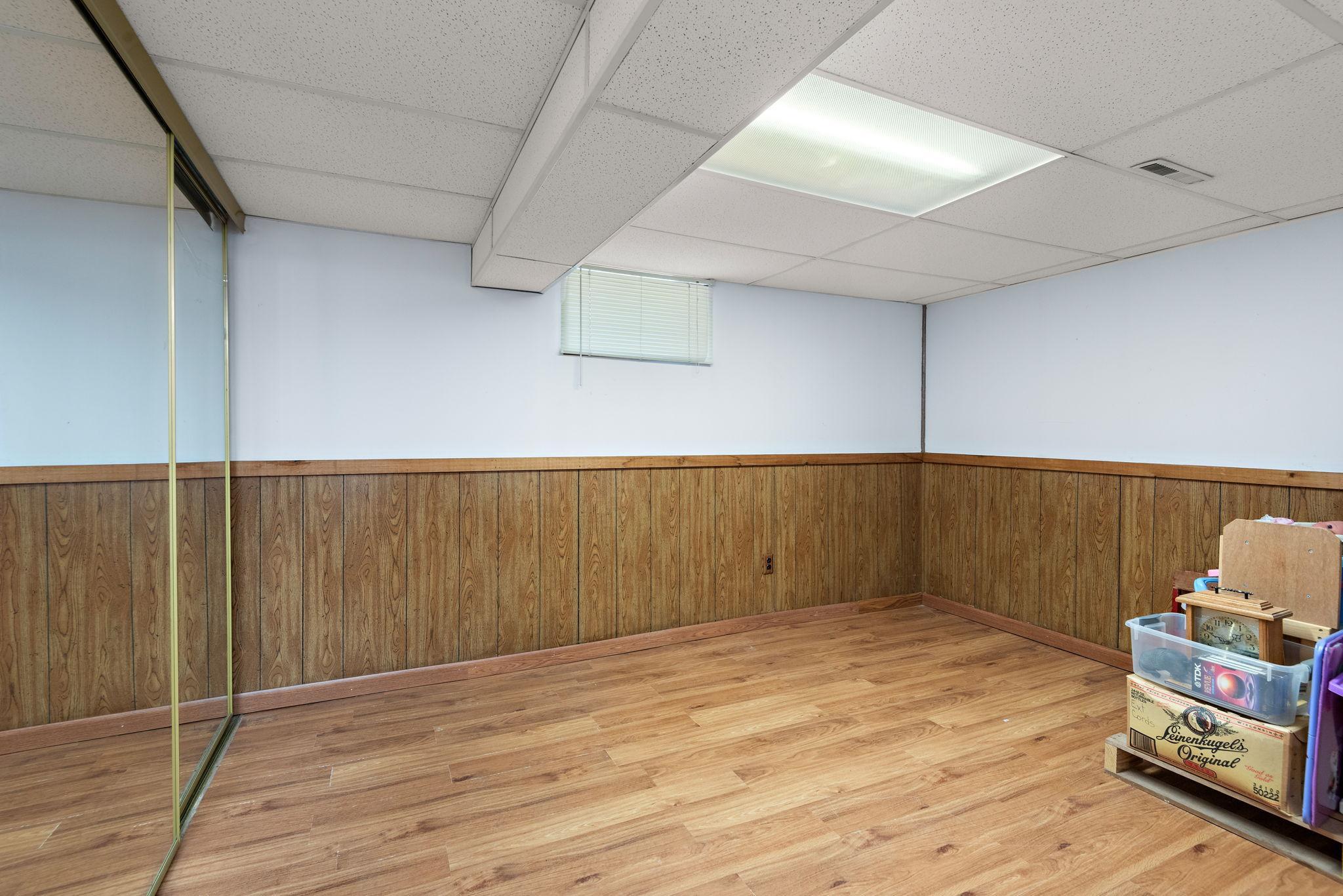 Room in lower level may be converted to legal BR 3 if an egress window were to be put in. Closet is already there.