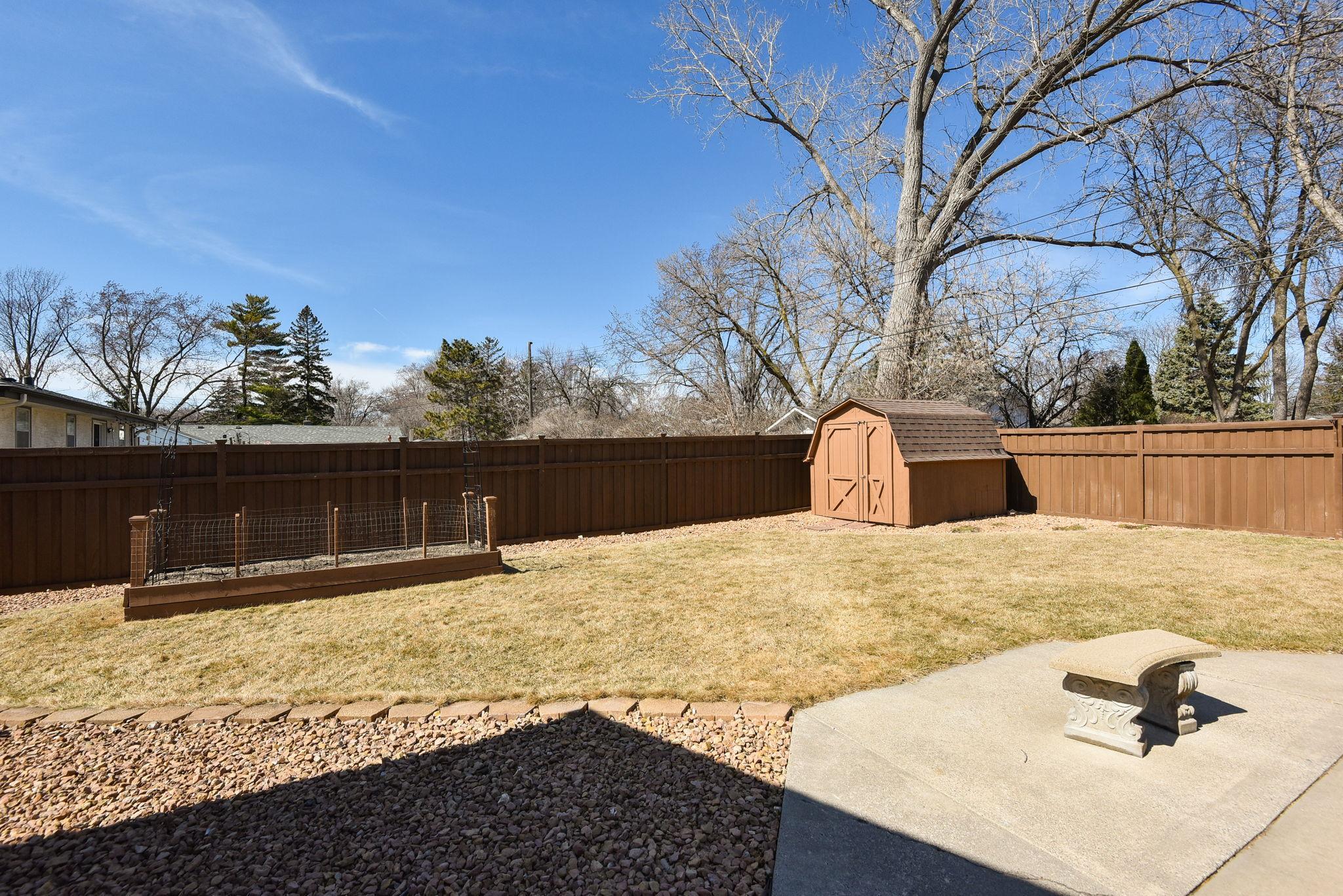 Convenient back yard shed for storage!