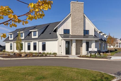 Community clubhouse with outdoor pool, exercise room and gathering space.