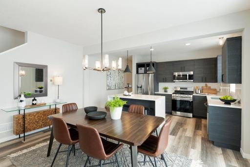Photos are from previous, similar model. The options, features and color scheme will vary. Actual home has white shaker style kitchen cabinets.