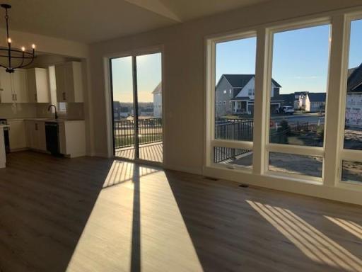 The day coming to and end but not without enjoying the sun filled space. Photos are from previously built home; options and features will vary