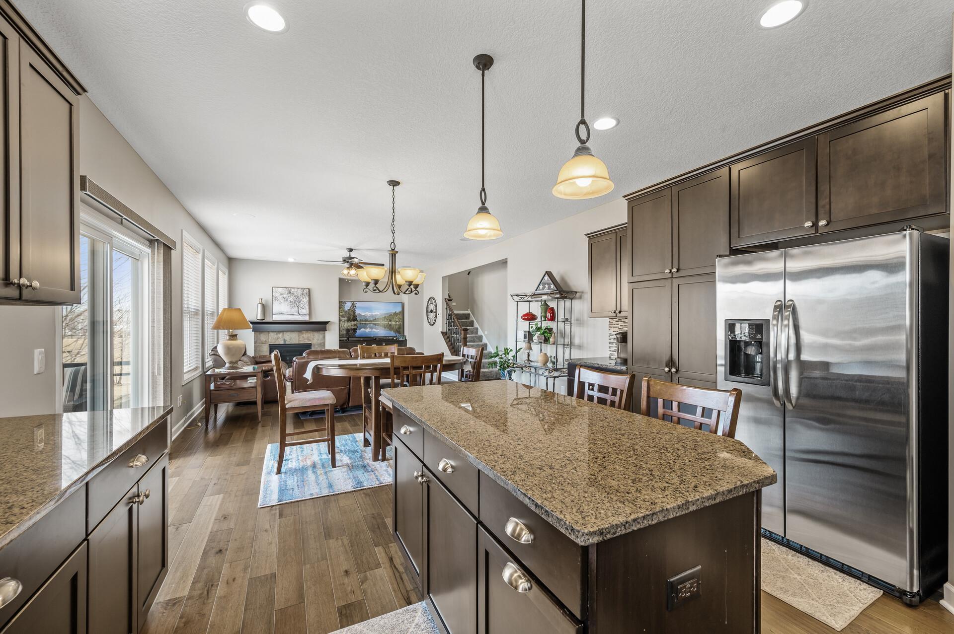 The island is perfect for casual seating and quick meals while the informal dining area can easily accommodate larger gatherings.