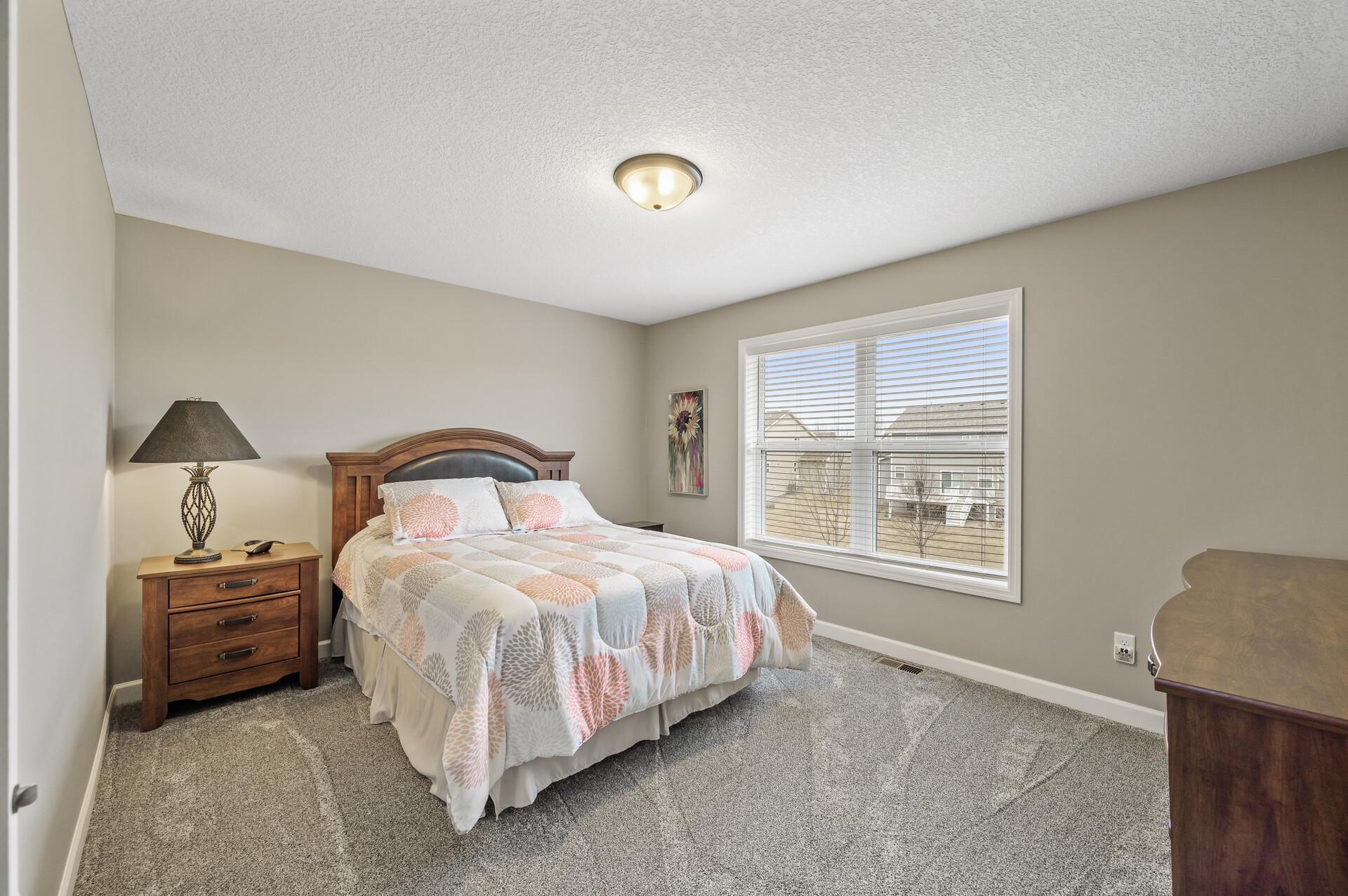 Fourth upper level bedroom.