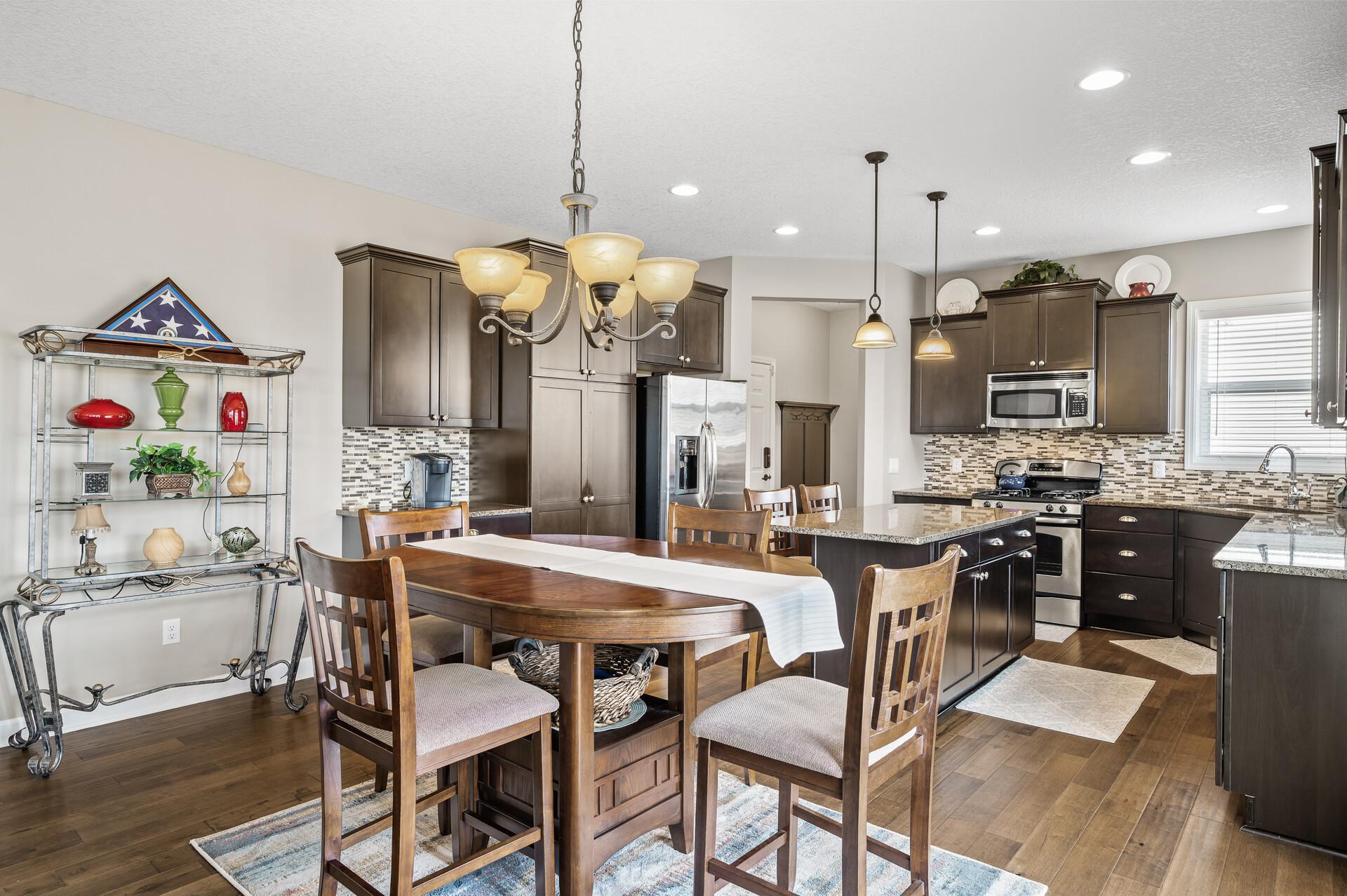 The informal dining area is perfect for simple meals or large gatherings.