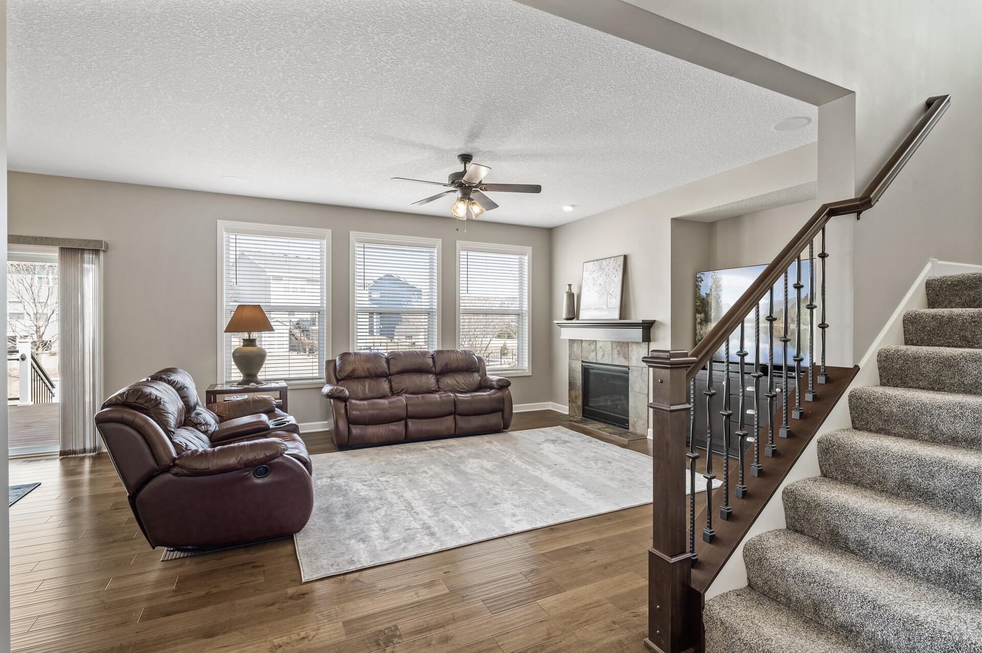 The impressive style of this home begins immediately with gleaming hard surface floors that flow throughout the main level.