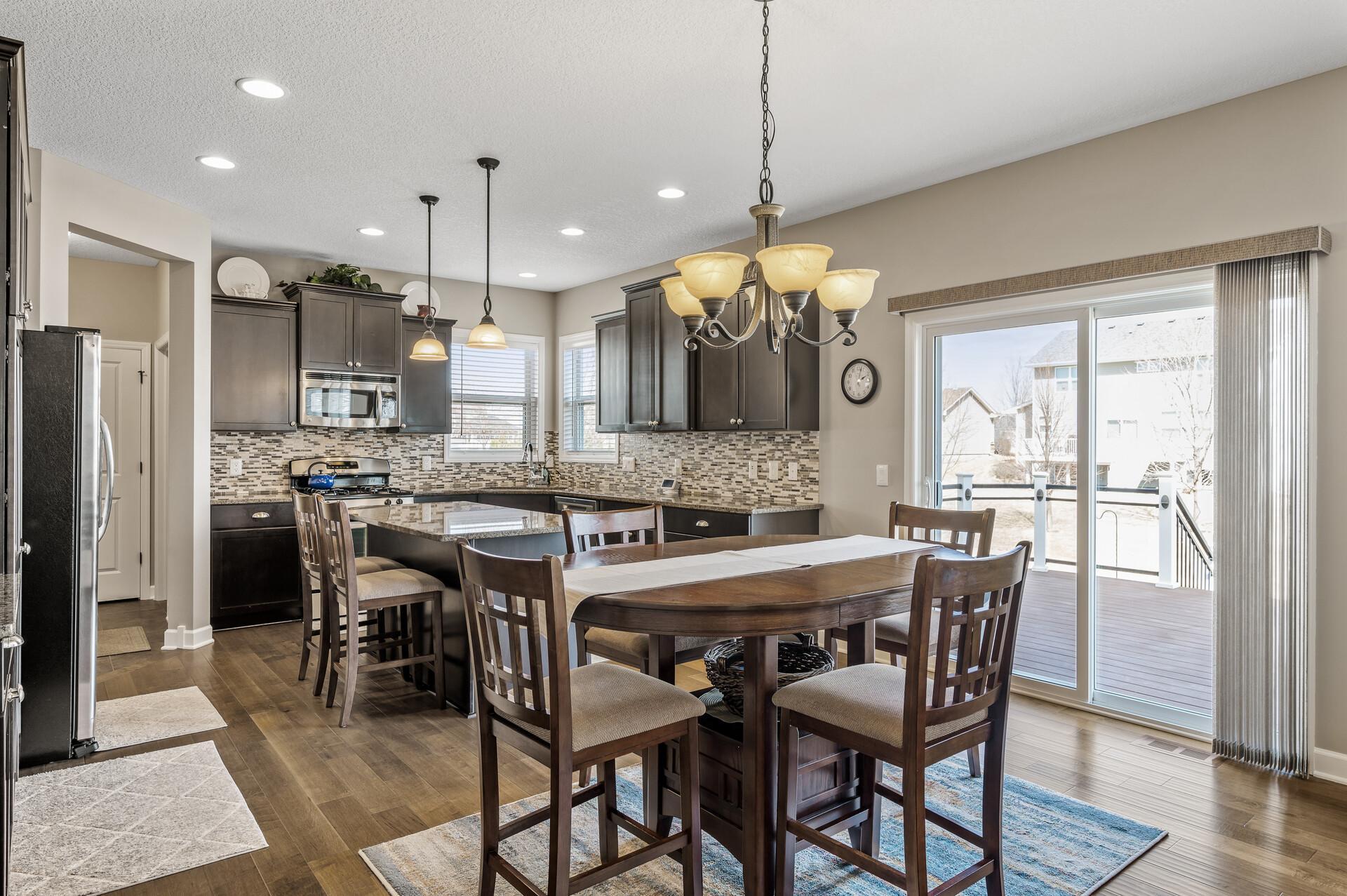 The large sliding glass doors provide easy access to the deck, seamlessly extending your living and entertaining space.