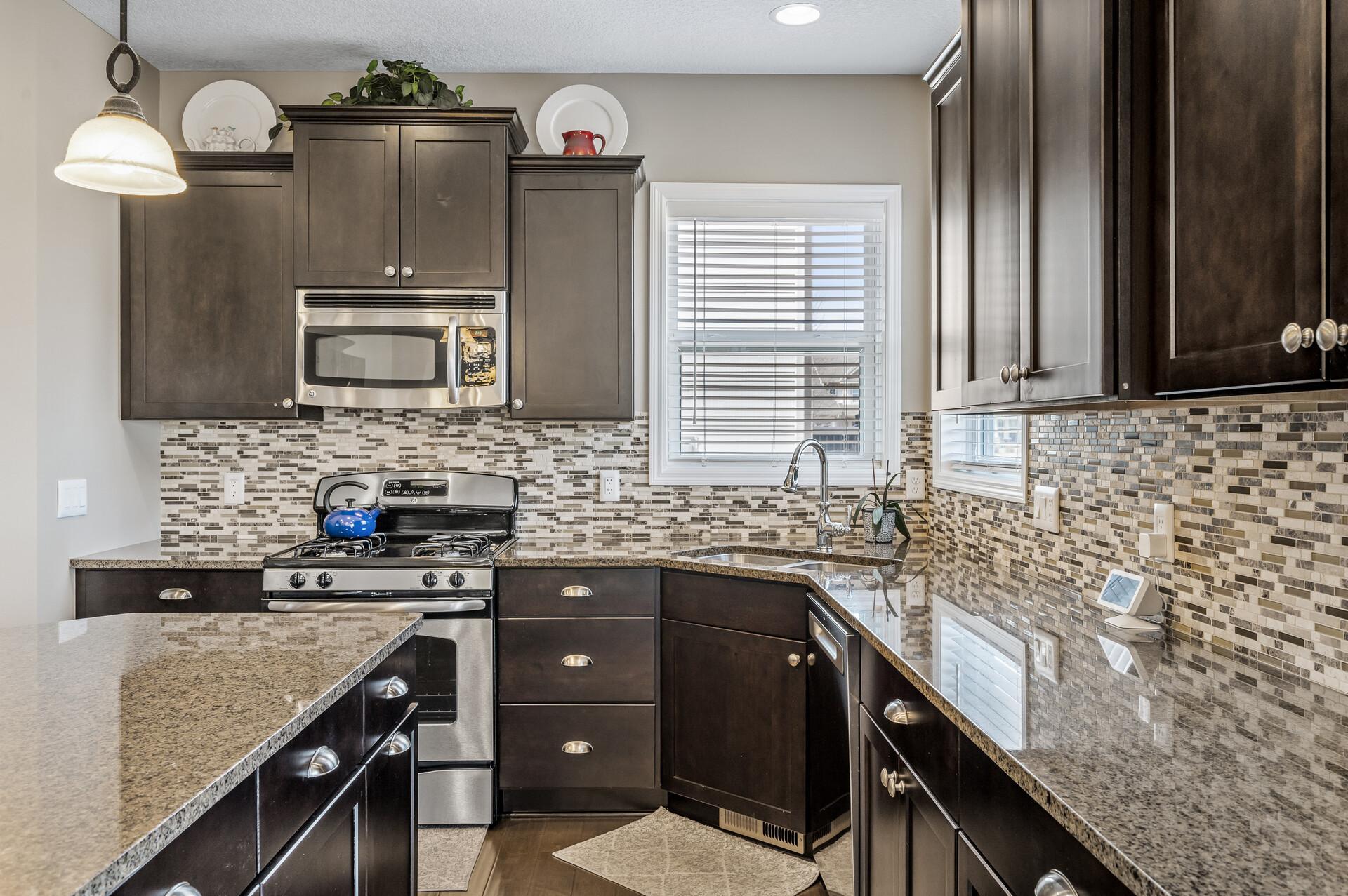 A close-up view of the kitchen, showcasing its stunning finishes and thoughtfully designed features.