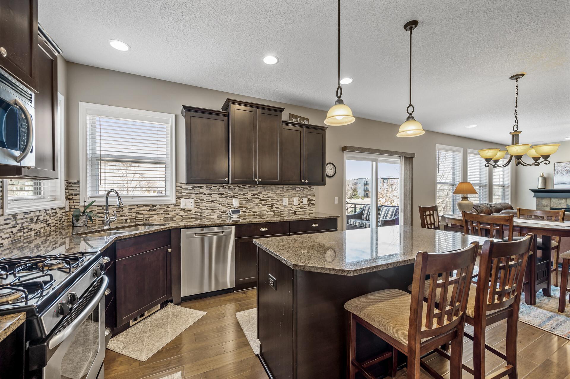 Natural light enhances the warmth of the timeless finishes.