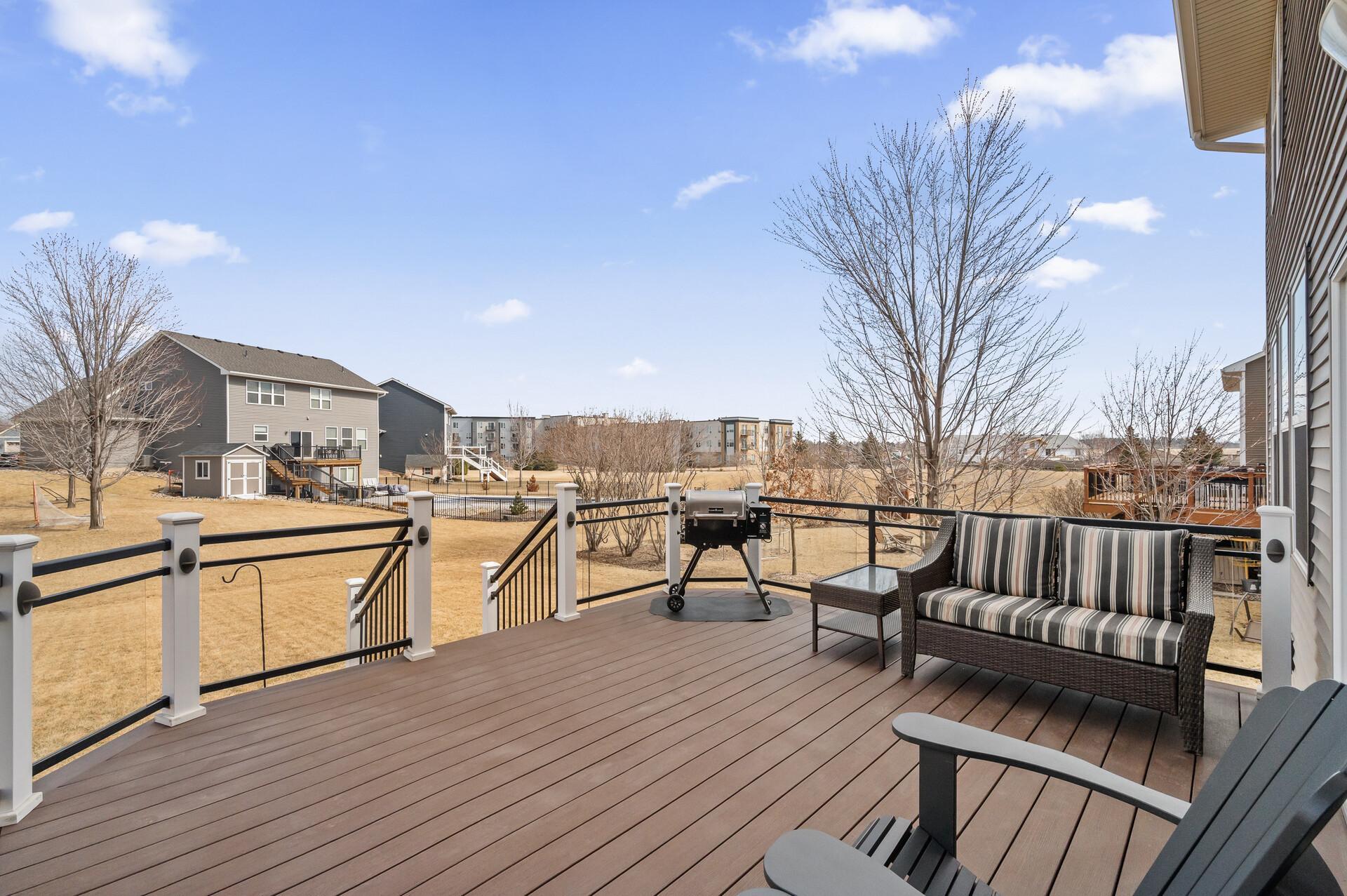 The spacious, maintenance-free deck provides an ideal outdoor living area.